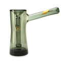 a green glass vase with a black base